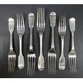 Seven William IV and later silver fiddle back table forks, all with a single initial engraved to the... 
