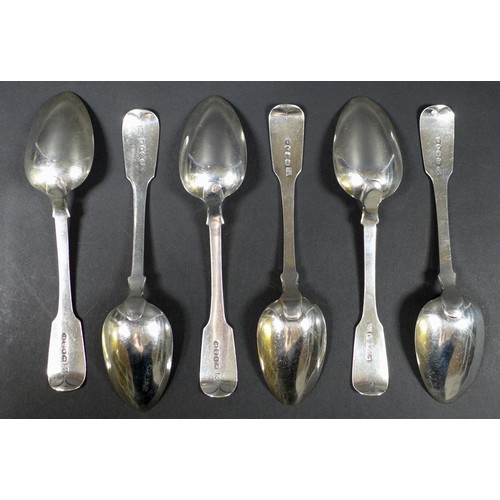 29 - Six George IV silver fiddle back pattern dessert spoons,  all engraved with a single indistinct lett... 