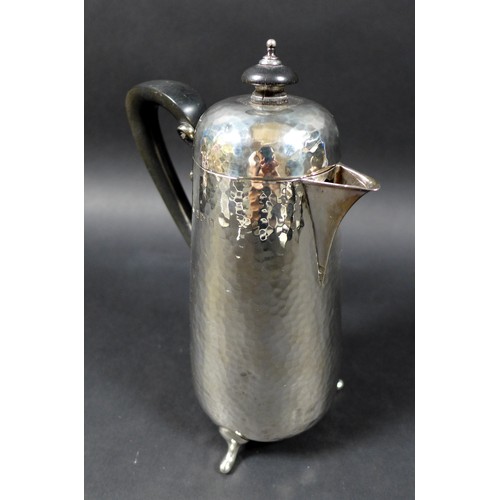 38 - An Edward VII silver hot water or chocolate pot, in Arts & Crafts taste, of tapering cylindrical for... 