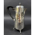 An Edward VII silver hot water or chocolate pot, in Arts & Crafts taste, of tapering cylindrical for... 