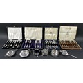 A collection of Edwardian and later silver items, to include four cased sets of six teaspoons, two s... 
