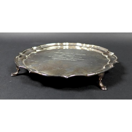 37 - An Elizabeth II silver waiter tray, with Chippendale piecrust rim, presentation engraved 'The Ford D... 
