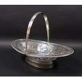 A Victorian silver swing handled fruit basket, the pierced sides decorated with friezes of leaves an... 