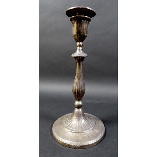 44 - A pair of George III silver candlesticks, the slender knopped columns with fine reeded decoration, d... 