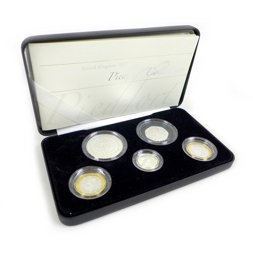 152 - A group of three Elizabeth II Royal Mint UK proof coin sets, comprising 2007 silver coin collection ... 