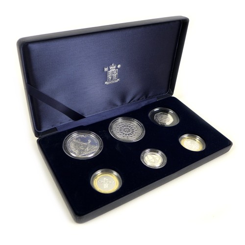 152 - A group of three Elizabeth II Royal Mint UK proof coin sets, comprising 2007 silver coin collection ... 