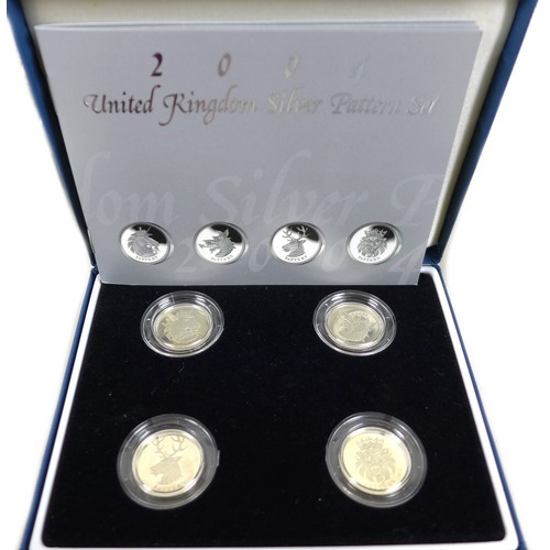 144 - A group of twenty Elizabeth II Royal Mint UK silver coins, comprising two silver proof 50p, 1998 and... 