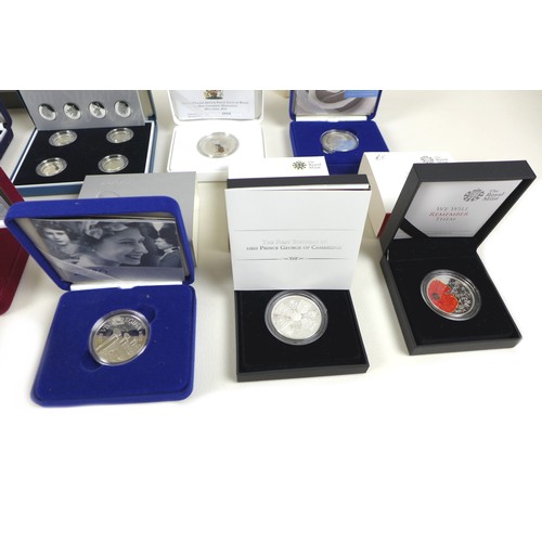 144 - A group of twenty Elizabeth II Royal Mint UK silver coins, comprising two silver proof 50p, 1998 and... 