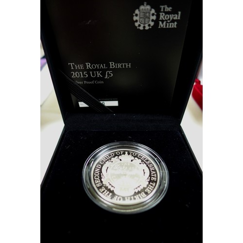 144 - A group of twenty Elizabeth II Royal Mint UK silver coins, comprising two silver proof 50p, 1998 and... 