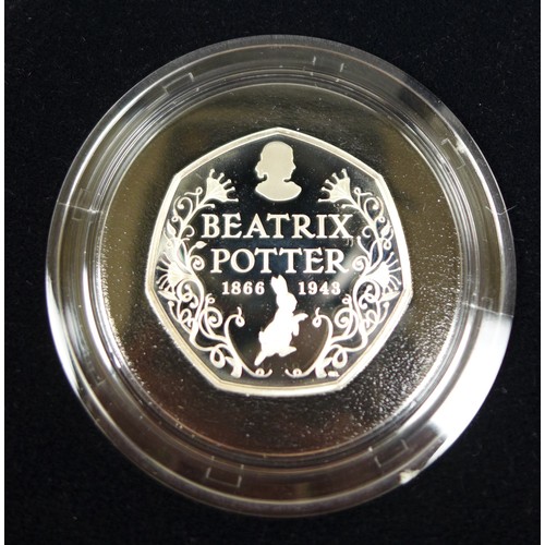 124 - Sixteen Elizabeth II Royal Mint Beatrix Potter themed silver proof 50p coins, spanning 2016-2019, in... 