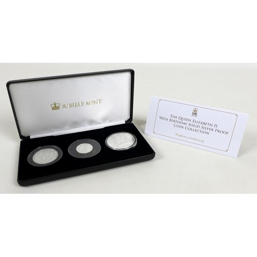 128 - Three Elizabeth II Jubilee mint commemorative silver proof coin sets, comprising three £5, £2 and £1... 