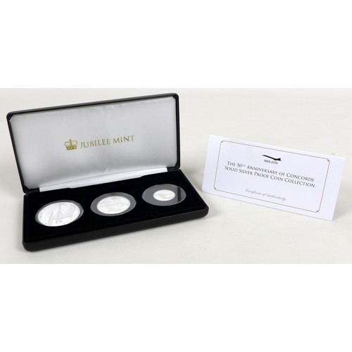 128 - Three Elizabeth II Jubilee mint commemorative silver proof coin sets, comprising three £5, £2 and £1... 