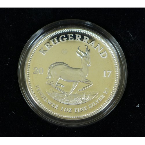 136 - Three South Africa Mint 2017 fine silver Krugerrands, comprising two premium uncirculated Krugerrand... 