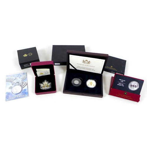 104 - Four Canadian silver and nickel proof coins, including a 2005 fine silver WWI 60th anniversary 5 dol... 