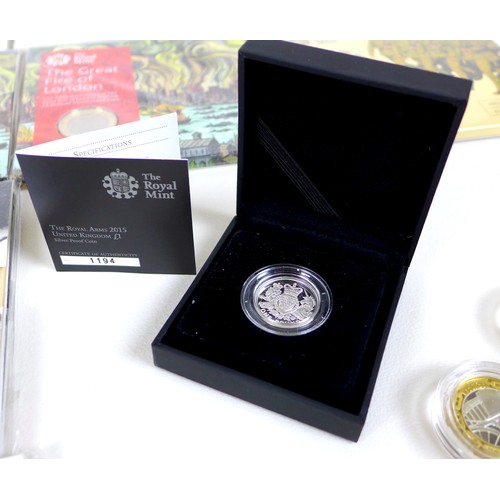 122 - A collection of Elizabeth II Royal Mint issue silver proof and brilliant uncirculated £2 and £1 coin... 