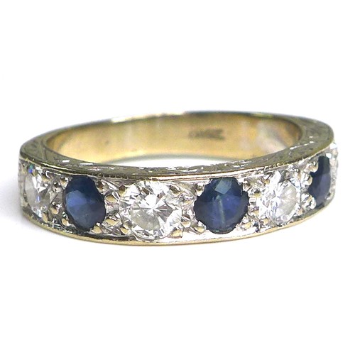 374 - An 18ct white gold, sapphire and diamond seven stone ring, the three round cut sapphires, each 4mm, ... 