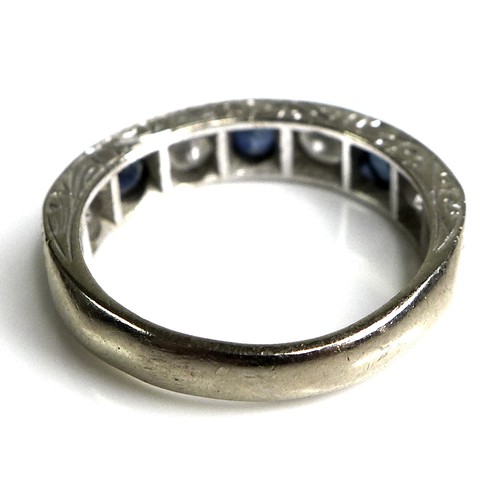 374 - An 18ct white gold, sapphire and diamond seven stone ring, the three round cut sapphires, each 4mm, ... 