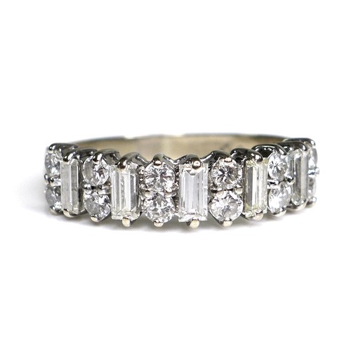 376 - An 18ct white gold and diamond ring, five baguette cut stones, each 5.1 by 2.3 by 1.6mm, 0.17ct, set... 