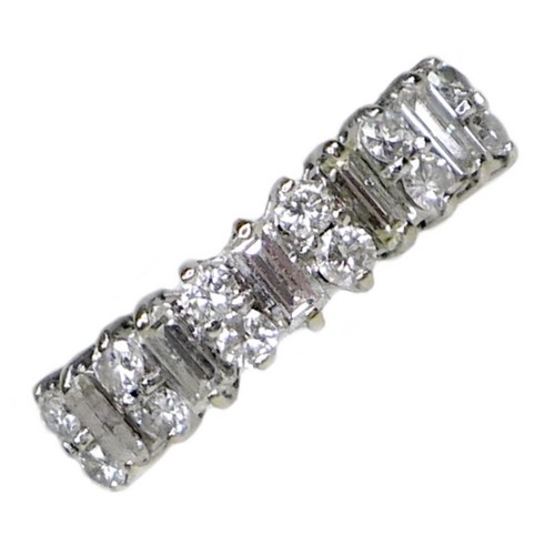 376 - An 18ct white gold and diamond ring, five baguette cut stones, each 5.1 by 2.3 by 1.6mm, 0.17ct, set... 