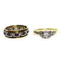 An 18ct gold, platinum and moissanite ring, size O, 2.2g, together with a 9ct gold eternity ring set... 