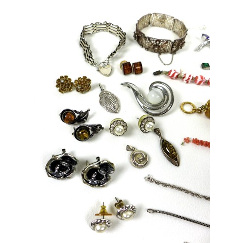 249 - A small collection of costume jewellery, including a silver bracelet with heart padlock, two other b... 