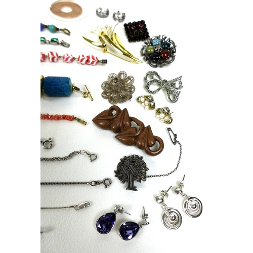 249 - A small collection of costume jewellery, including a silver bracelet with heart padlock, two other b... 