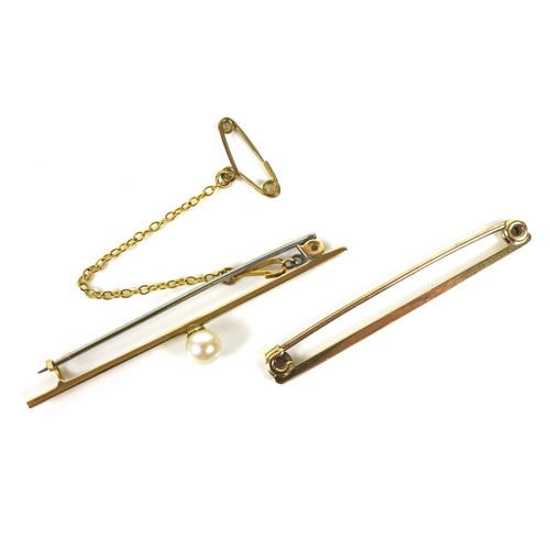 251 - Two 9ct gold bar brooches, the first set with a single cultured pearl, 5.2cm, with safety chain, 2g,... 