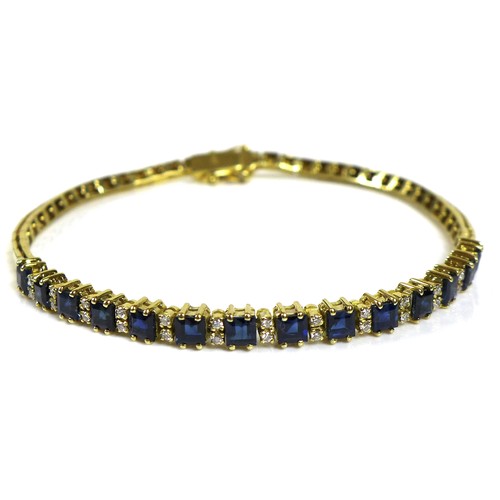 365 - An 18ct gold, sapphire and diamond bracelet, the fourteen princess cut royal blue sapphires each of ... 