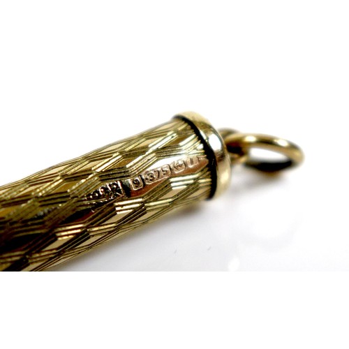 254 - A 9ct gold propelling cigar piercer, with ring suspension and engraved decoration to the cylindrical... 