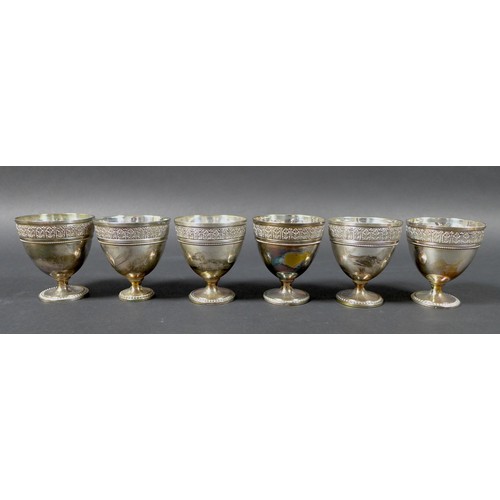 55 - A set of six Cristofle goblet style silver plated egg cups, stamped 'Cristofle' to base rims, each 5... 