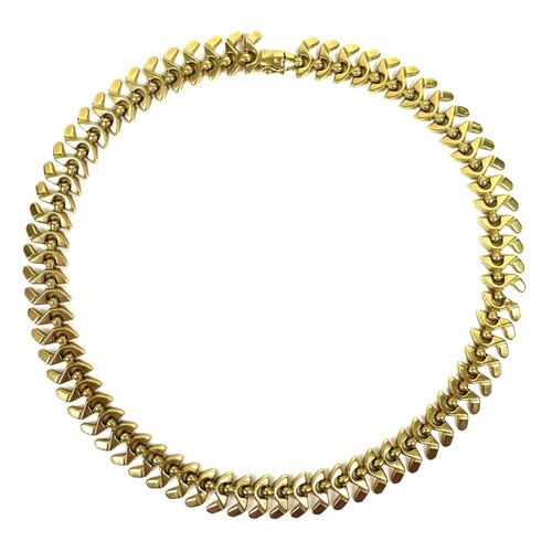 373 - An 18ct gold modern design necklace, stamped '750' the abstract S-shaped links joined by small spher... 