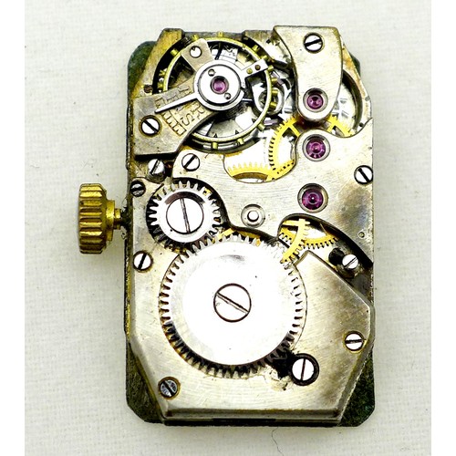 258 - An 18ct gold cased lady's cocktail watch, circa 1930, the rectangular silvered dial with black Arabi... 