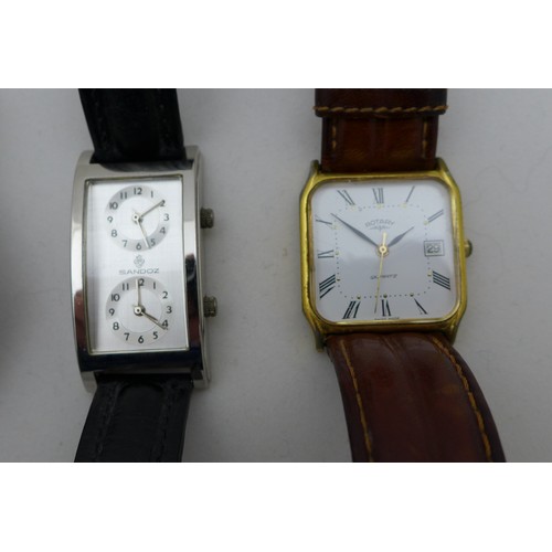68 - A group of four gentleman's wristwatches, comprising a Seiko stainless steel wristwatch, model 6300-... 