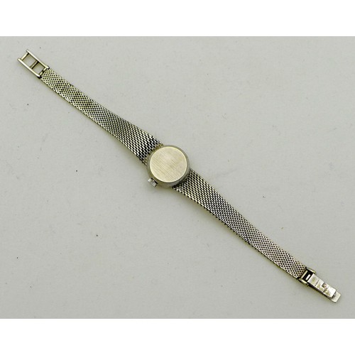 82 - A vintage Avia 9ct white gold cased lady's wristwatch, circular silver dial with black baton numeral... 