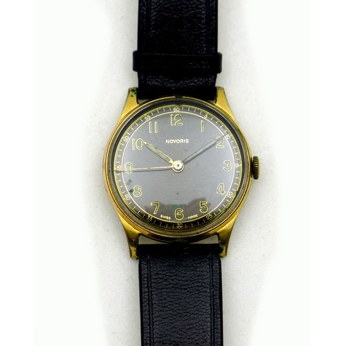 71 - A vintage Novoris gold plated gentleman's wristwatch, circa 1950, circular black dial with gold and ... 