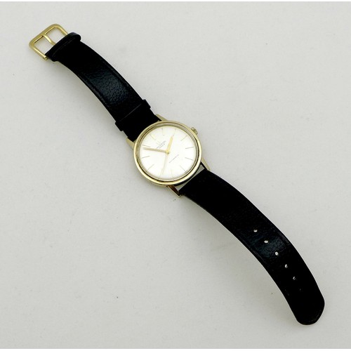 79 - A Universal Geneve Automatic 9ct gold cased gentleman's wristwatch, circa 1970s, the circular silver... 