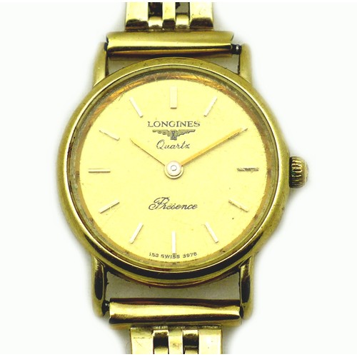 73 - A vintage Longines Presence 9ct gold lady's wristwatch, circular gold dial with gold baton numerals,... 