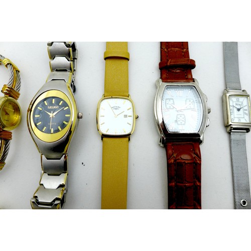 69A - A group of nine modern wristwatches, including a Seiko stainless steel and gold plated watch, two Ro... 