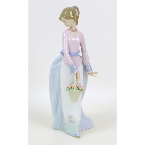 36 - Three Lladro figurines, comprising 'Opening night' 5498, 'Basket of Love' 7622, 'Naughty girl with s... 