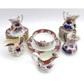 A Victorian part tea set, decorated in Imari palette with flowers, and four Victorian Mason's jugs, ... 