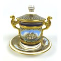 A Spode England twin handled cup with cover and saucer, 'The Shipwright's Cup', limited edition 408/... 