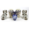 A group of ceramics, comprising a pair of Staffordshire spaniels, 21cm, a pair of footed vases by Bu... 