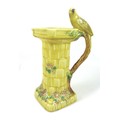 A vintage ceramic jug, by Waddenheath, circa 1960, modelled as a budgerigar perched on a column with... 