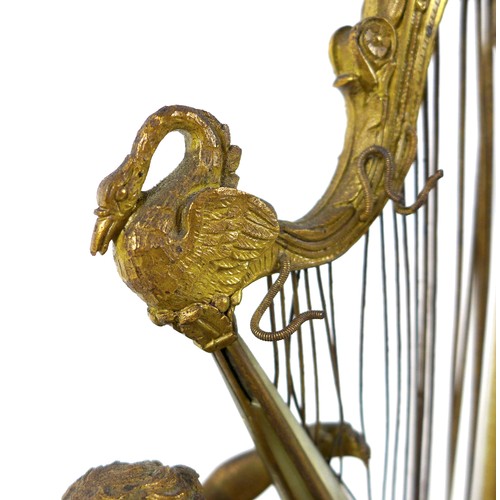 106 - A French Palais Royale ormolu jewel stand incorporating a music box, early 19th century, in the form... 