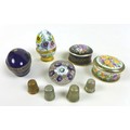 A group of small ornaments, comprising a small paperweight, 4.7 by 3.5cm, a Dubarry Limoges egg shap... 