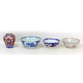 A group of four Japanese and European ceramics, comprising a 19th century Japanese Imari pattern sto... 
