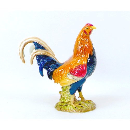 42 - A Beswick figurine of a gamecock, numbered 2059, 21 by 10 by 23.5cm high.