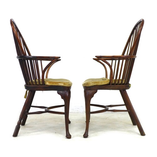 291 - A pair of Georgian yew, elm and oak Windsor armchairs, each with a pierced splat, shaped arms and sa... 