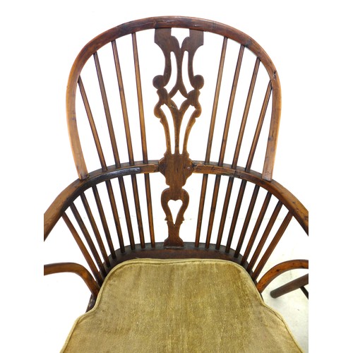 291 - A pair of Georgian yew, elm and oak Windsor armchairs, each with a pierced splat, shaped arms and sa... 