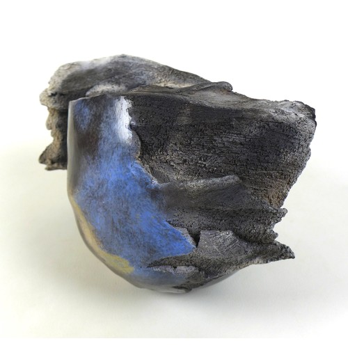 17 - Anne Bulliot (French, b. 1961): a raku pottery ‘Volcanic’ bowl, 20 by 26cm high.